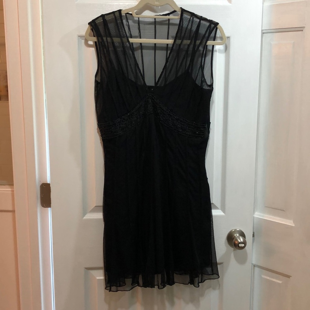 Sleeveless beaded v neck cocktail dress